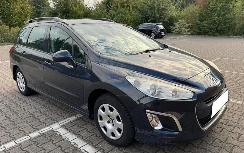 Grau Gebraucht 2011 Peugeot 308 Kombi | 1.850 € (Superpreis) - Bild 1/4