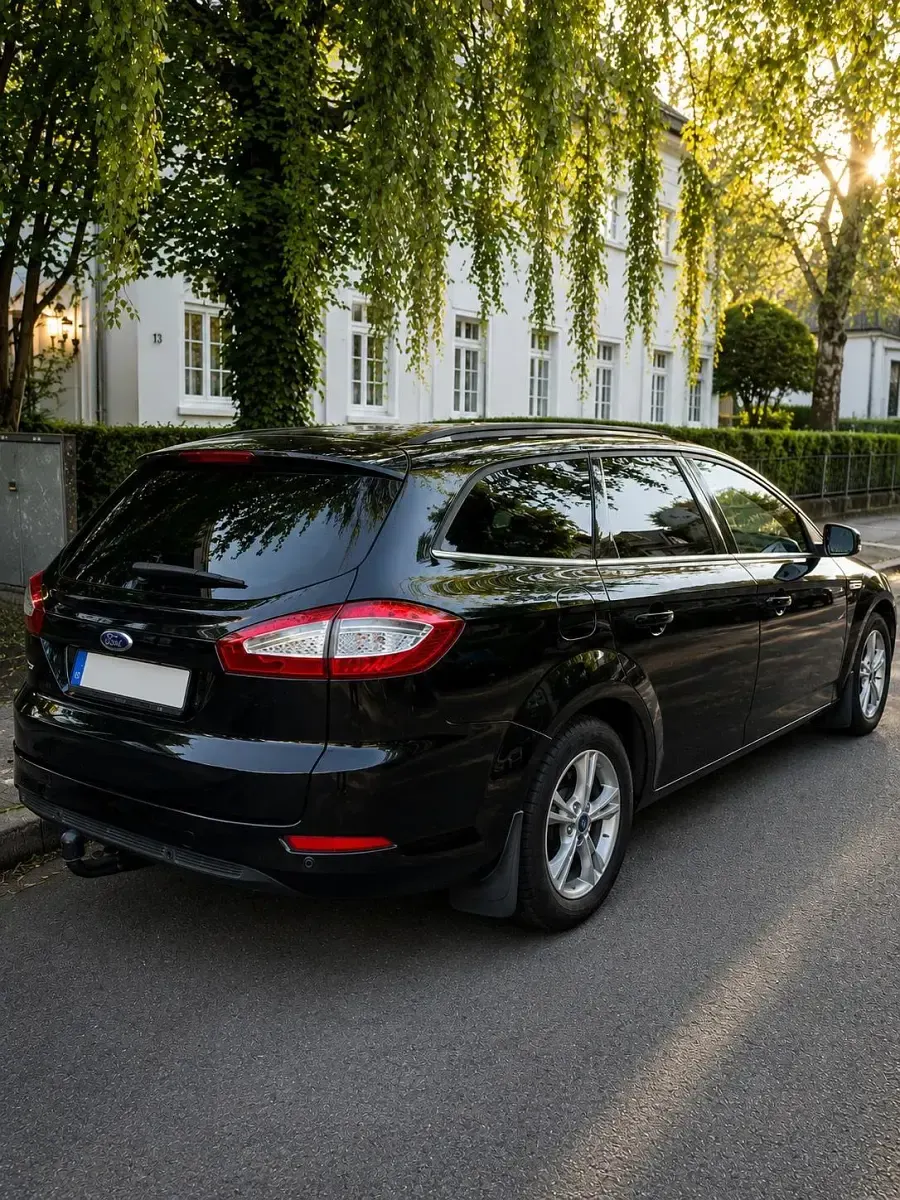 Gebraucht Ford Mondeo Titanium 140 PS (102 kW) 2012 Schwarz Kombi