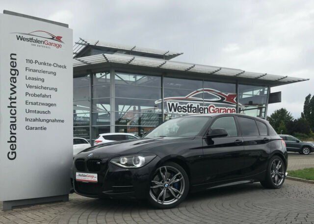 Schwarz metallic Gebraucht 2014 BMW M135 Comfort Edition Kleinwagen | 25.490 € (Etwas zu teuer) - Bild 1/4