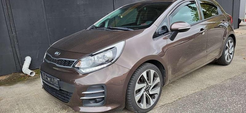 Bronze Gebraucht 2015 Kia Rio Limousine | 9.500 € (Fairer Preis) - Bild 1/4