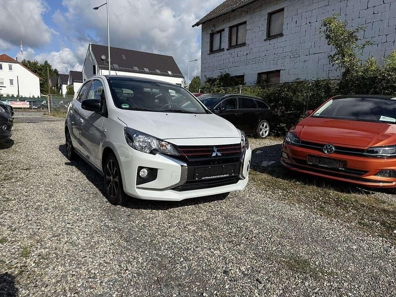 Weiß Gebraucht 2024 Mitsubishi Space Star Select+ Kleinwagen | 9.799 € (Superpreis) - Bild 1/4