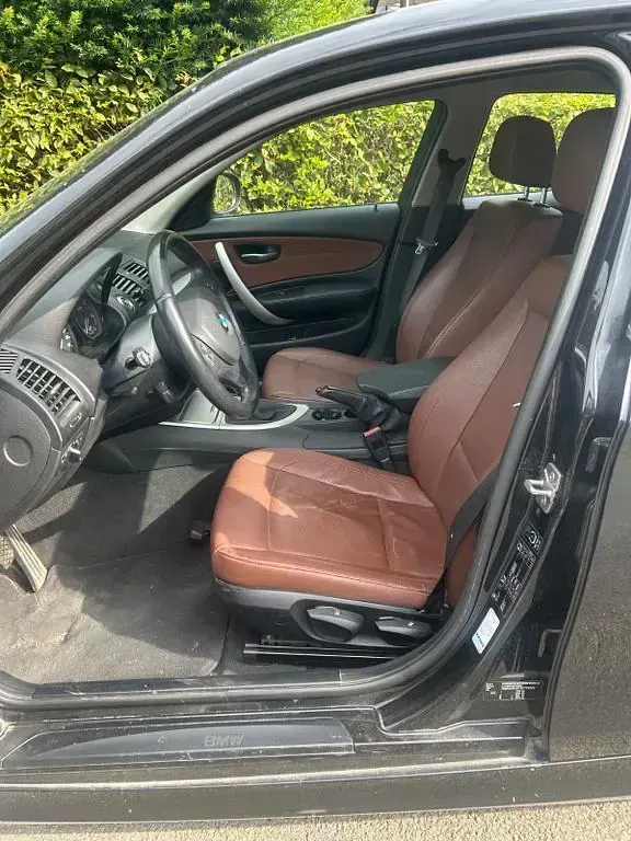 Gebraucht BMW 116 Lifestyle 116 PS (85 kW) 2011 Schwarz Kleinwagen