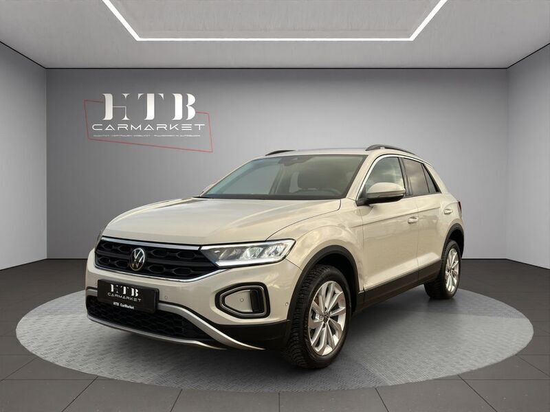 Ascotgrau (metallic) Gebraucht 2023 VW T-Roc Life SUV | 23.990 € (Superpreis) - Bild 1/4