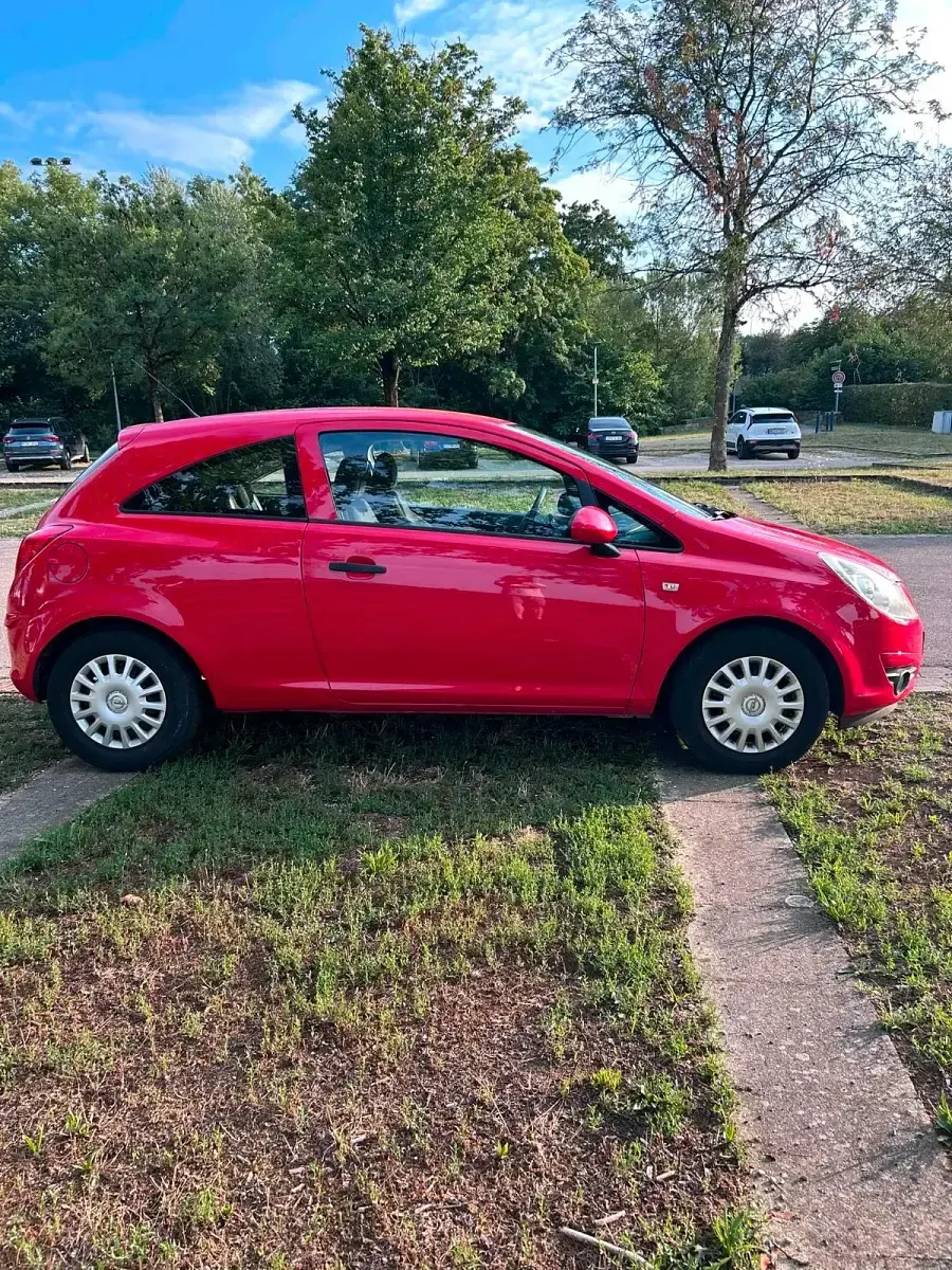 Gebraucht Opel Corsa 80 PS (58 kW) 2009 Rot Kleinwagen