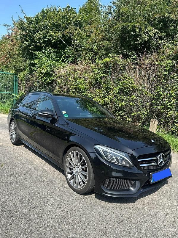 Schwarz Gebraucht 2016 Mercedes C250 AMG line Kombi | 16.500 € (Superpreis) - Bild 1/4