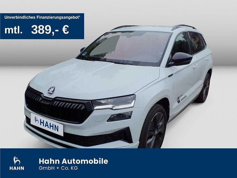 Moonweiss metallic Gebraucht 2024 Skoda Karoq SportLine SUV | 34.930 € (Etwas zu teuer) - Bild 1/3