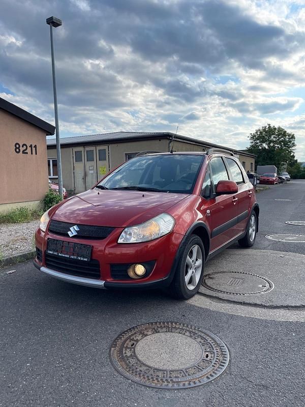 Orange Gebraucht 2007 Suzuki SX4 SUV | 2.350 € (Fairer Preis) - Bild 1/4