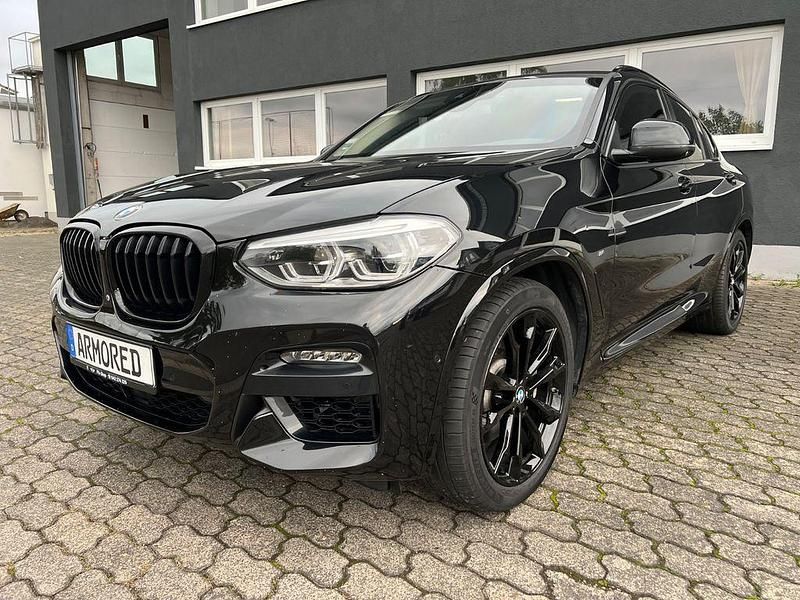 Black sapphire metallic Gebraucht 2019 BMW X4 Sport Line SUV | 99.960 € - Bild 1/4
