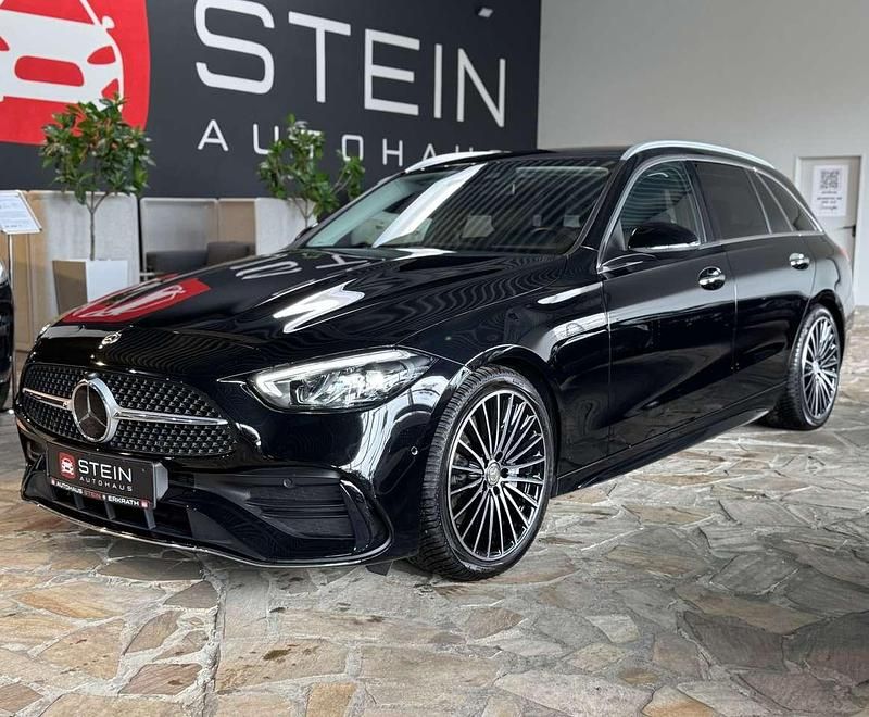 Schwarz unilack Gebraucht 2021 Mercedes 200 AMG line Kombi | 33.450 € - Bild 1/4