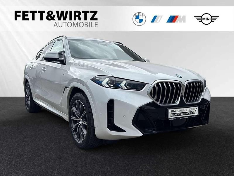 Mineralweiß metallic Gebraucht 2024 BMW X6 M Sport SUV | 83.800 € (Fairer Preis) - Bild 1/3