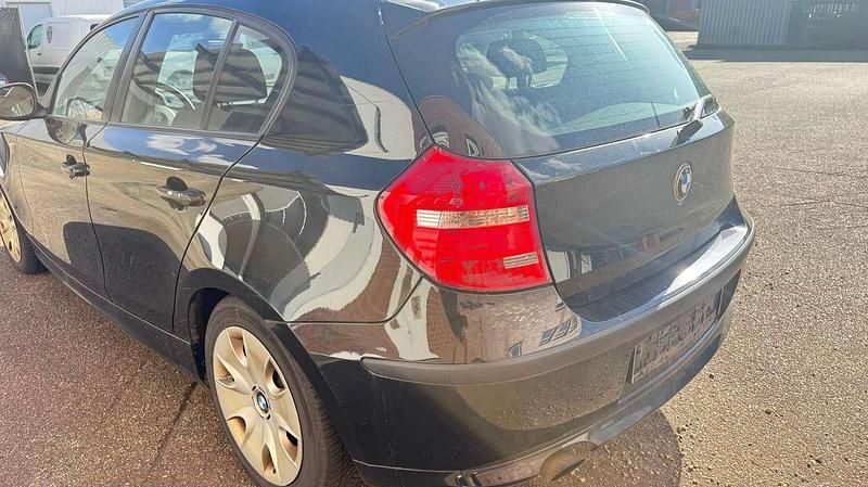 Gebraucht BMW 116 122 PS (89 kW) 2010 Schwarz ii Kleinwagen