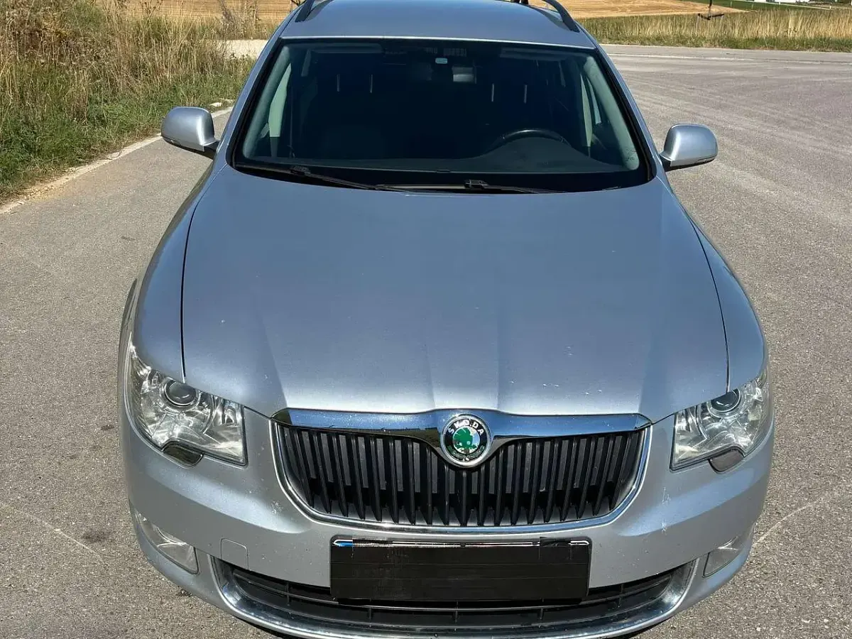 Używany Skoda Superb Ambition 170 KM (125 kW) 2012 Srebrny Kombi