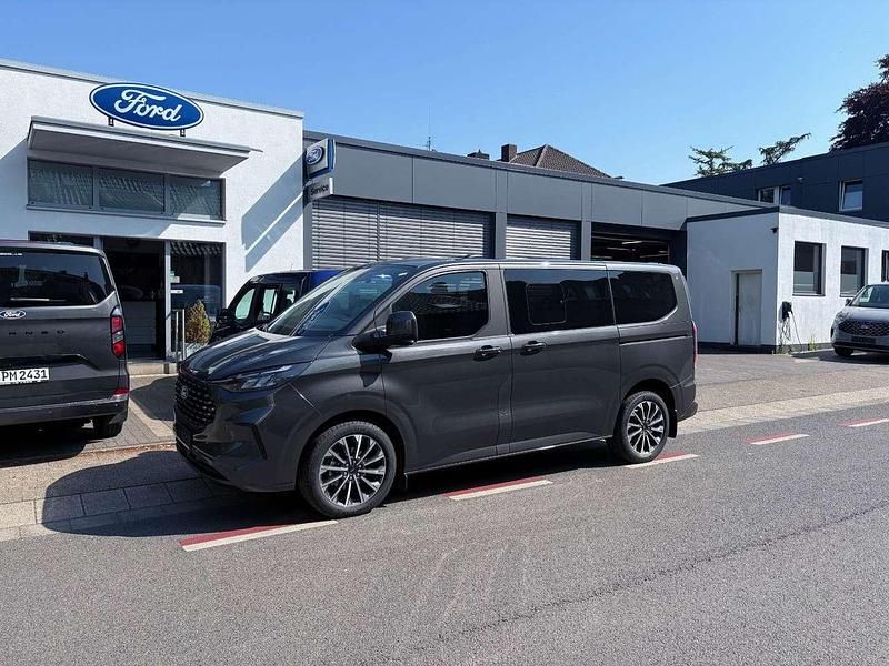 Grau Neu 2025 Ford Tourneo Custom Titanium X Van / Kleinbus | 56.990 € (Fairer Preis) - Bild 1/4