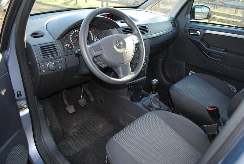 Second-hand Opel Meriva 105 CP (77 kW) 2009 Argintiu Monovolum