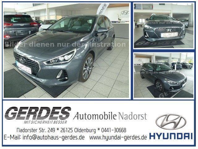 Grau metallic Gebraucht 2017 Hyundai i30 Premium Limousine | 23.990 € - Bild 1/4