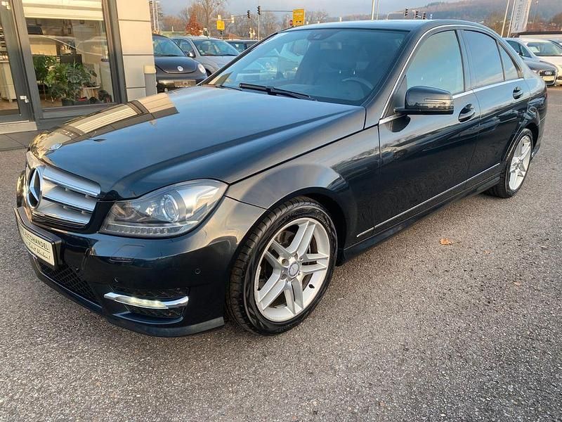 Magnetitschwarz metalliclack Gebraucht 2014 Mercedes C180 AMG Limousine | 13.450 € (Superpreis) - Bild 1/4
