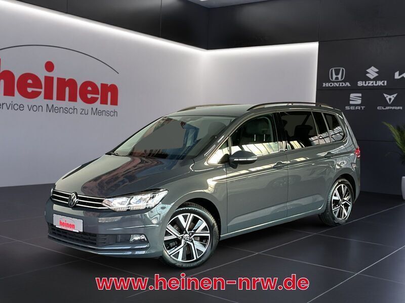 Grau Gebraucht 2023 VW Touran Comfortline Van / Kleinbus | 35.409 € (Teuer) - Bild 1/2