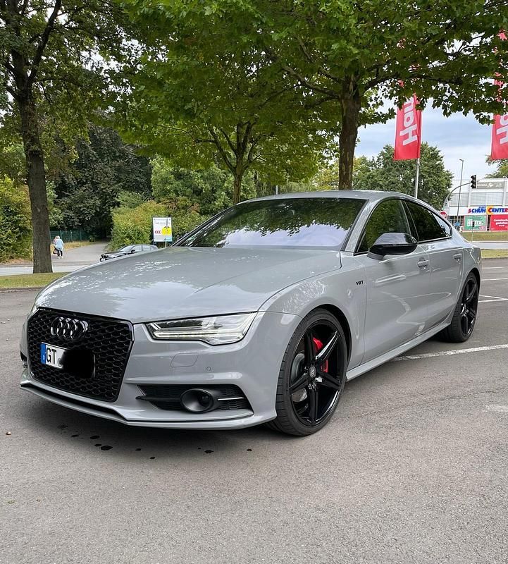 Grau Gebraucht 2016 Audi A7 Competition Kleinwagen | 26.999 € (Fairer Preis) - Bild 1/4
