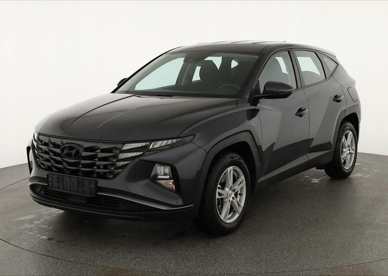 Dark night metallic Gebraucht 2022 Hyundai Tucson Pure SUV | 25.495 € (Fairer Preis) - Bild 1/4