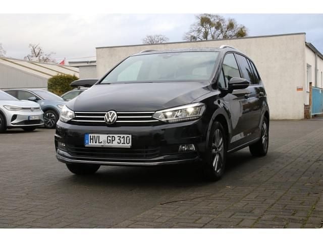 Używany VW Touran Active 150 KM (110 kW) 2022 Czarny Minivan