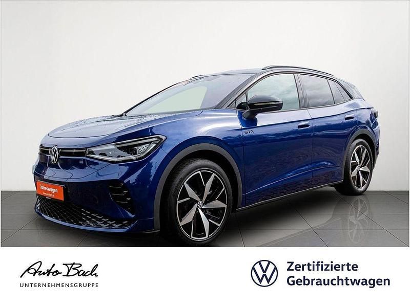 Blau (blue dusk metallic/schwarz) Gebraucht 2025 VW ID.4 GTX SUV | 42.630 € (Guter Preis) - Bild 1/4