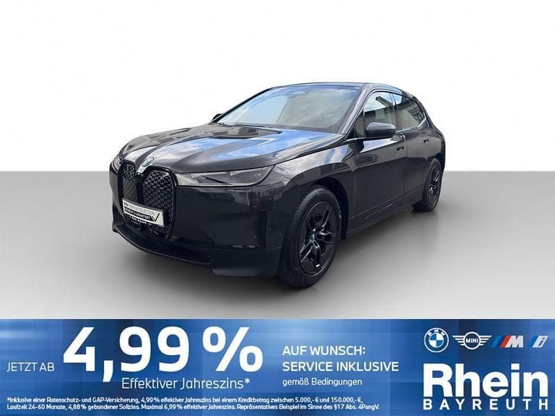Grau Gebraucht 2024 BMW iX SUV | 51.420 € (Guter Preis) - Bild 1/4