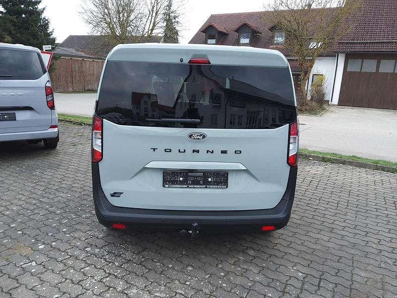Gebraucht Ford Tourneo Courier Trend 100 kW (136 PS) 2025 Cactus gray Van / Kleinbus