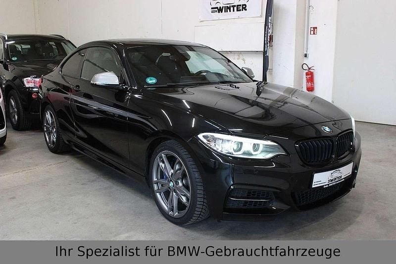 Saphirschwarz Gebraucht 2014 BMW M2 M Performance Coupé | 27.499 € - Bild 1/4