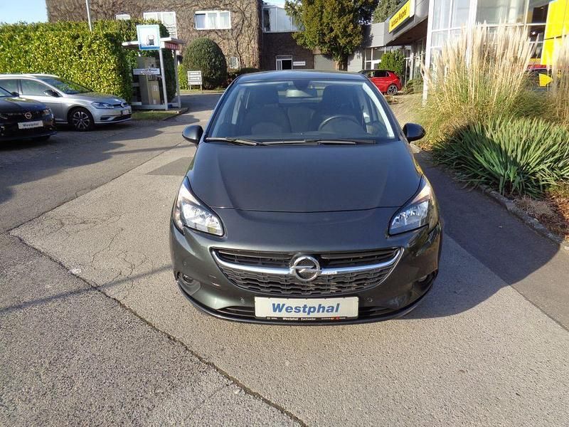Gebraucht Opel Corsa drive 90 PS (66 kW) 2017 Dunkel grau metallic Kleinwagen