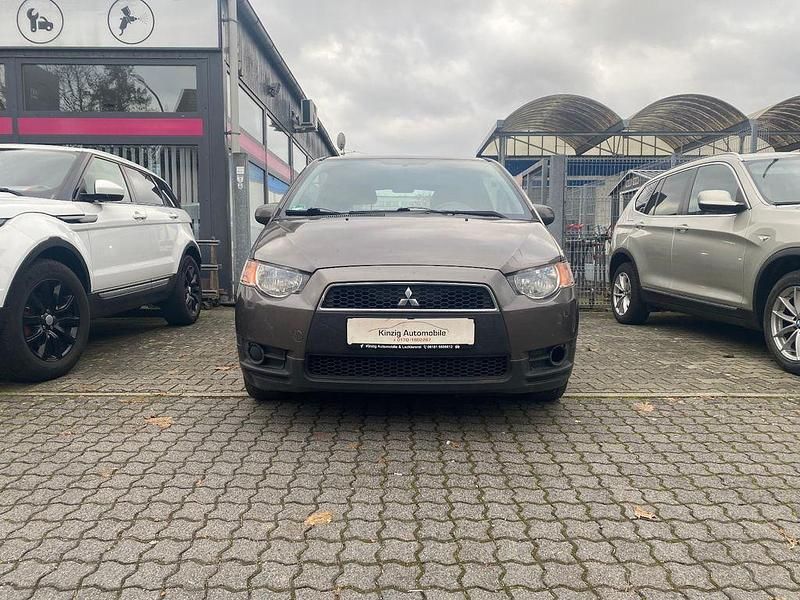 Gebraucht Mitsubishi Colt 75 PS (55 kW) 2011 Braun Kleinwagen