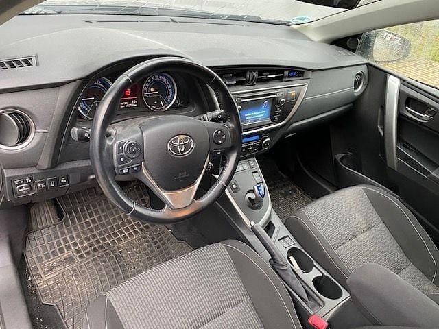 Gebraucht Toyota Auris Hybrid Business Edition 136 PS (100 kW) 2014 Avantgarde bronze metallic (metallic) Limousine