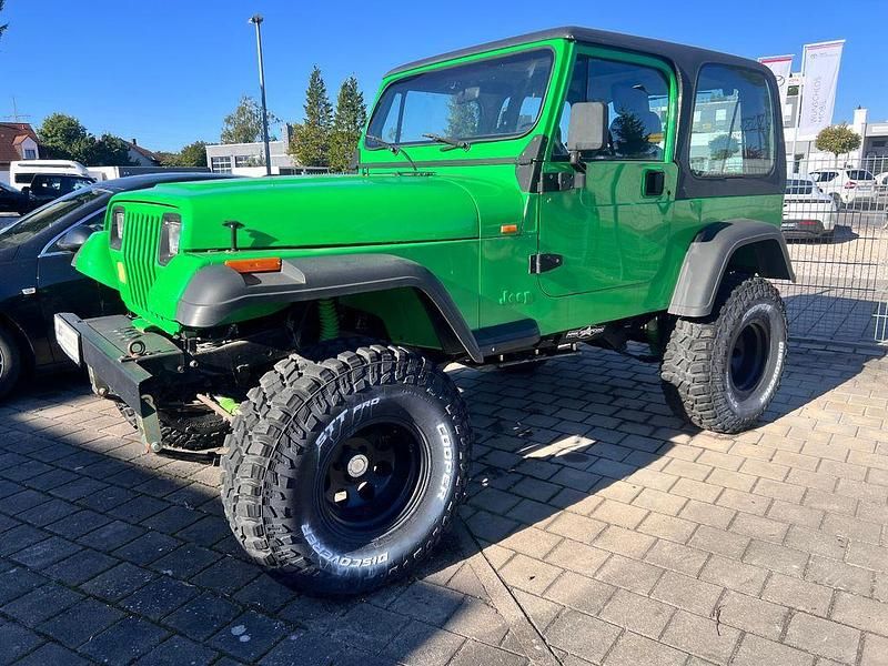 Grün Gebraucht 1994 Jeep Wrangler SUV | 14.900 € - Bild 1/4