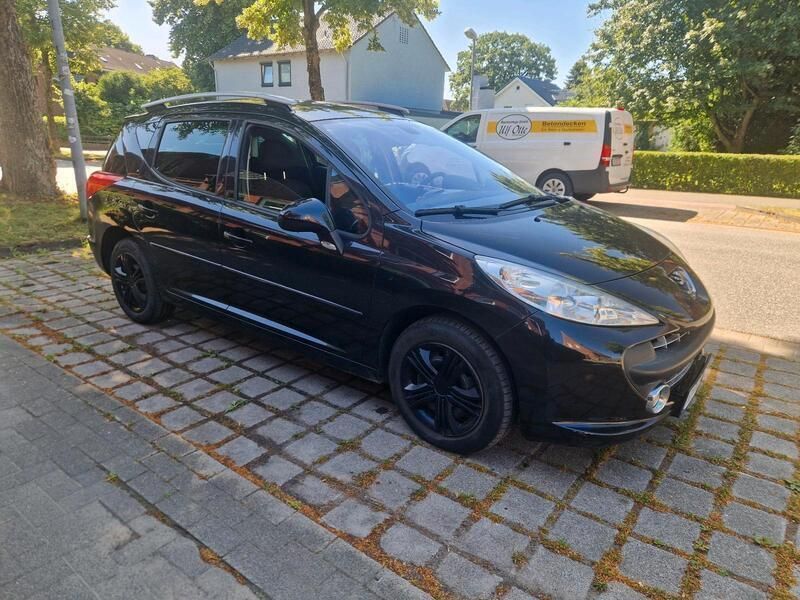 Schwarz Gebraucht 2009 Peugeot 207 Kombi | 1.900 € - Bild 1/4