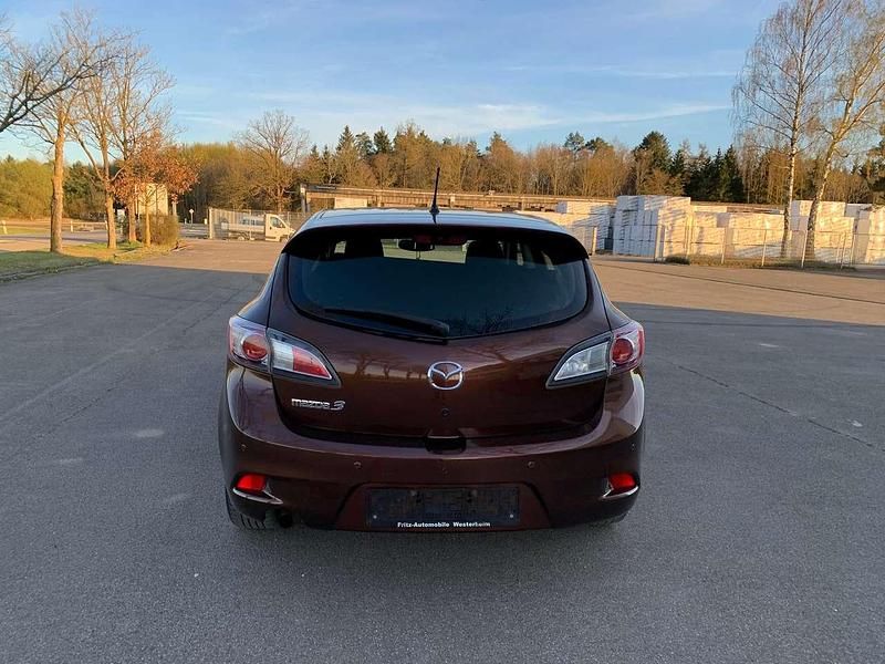 Gebraucht Mazda 3 Prime-Line 105 PS (77 kW) 2012 Autumn bronze mica Limousine