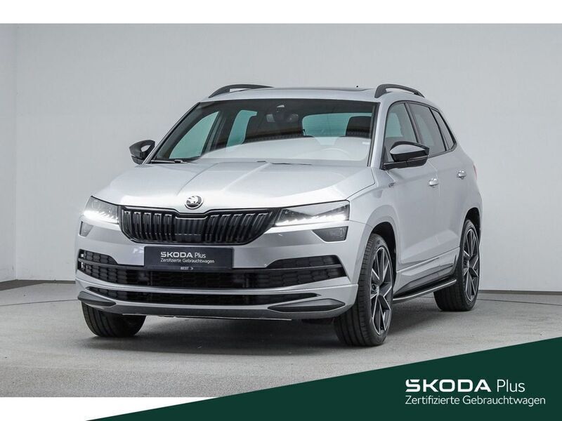 8e brilliantsilber metallic met. Gebraucht 2020 Skoda Karoq SportLine SUV | 27.999 € (Fairer Preis) - Bild 1/4