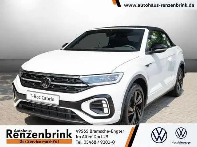Weiß (pure white schwarz) Gebraucht 2024 VW T-Roc Style SUV | 39.990 € - Bild 1/4