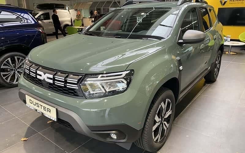 Safarigrüngrau Gebraucht 2023 Dacia Duster Journey SUV | 20.989 € (Guter Preis) - Bild 1/4