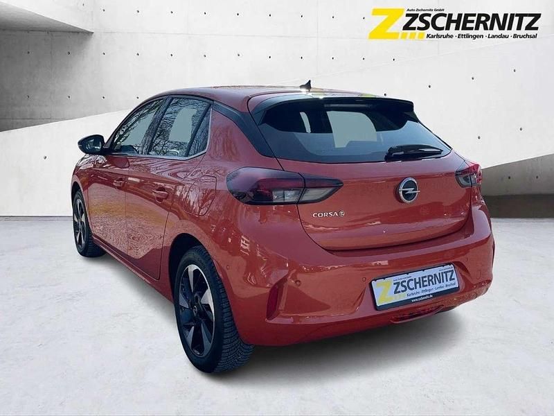 Gebraucht Opel Corsa-e Elegance 100 kW (136 PS) 2023 Power orange/dynamik orange Kleinwagen