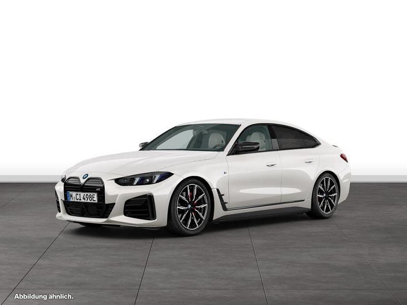 Mineralweiß metallic Gebraucht 2024 BMW i4 Comfort Edition Limousine | 62.714 € - Bild 1/4