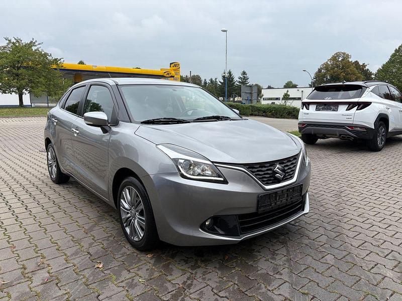 Grau Gebraucht 2018 Suzuki Baleno Comfort Limousine | 6.990 € (Superpreis) - Bild 1/4