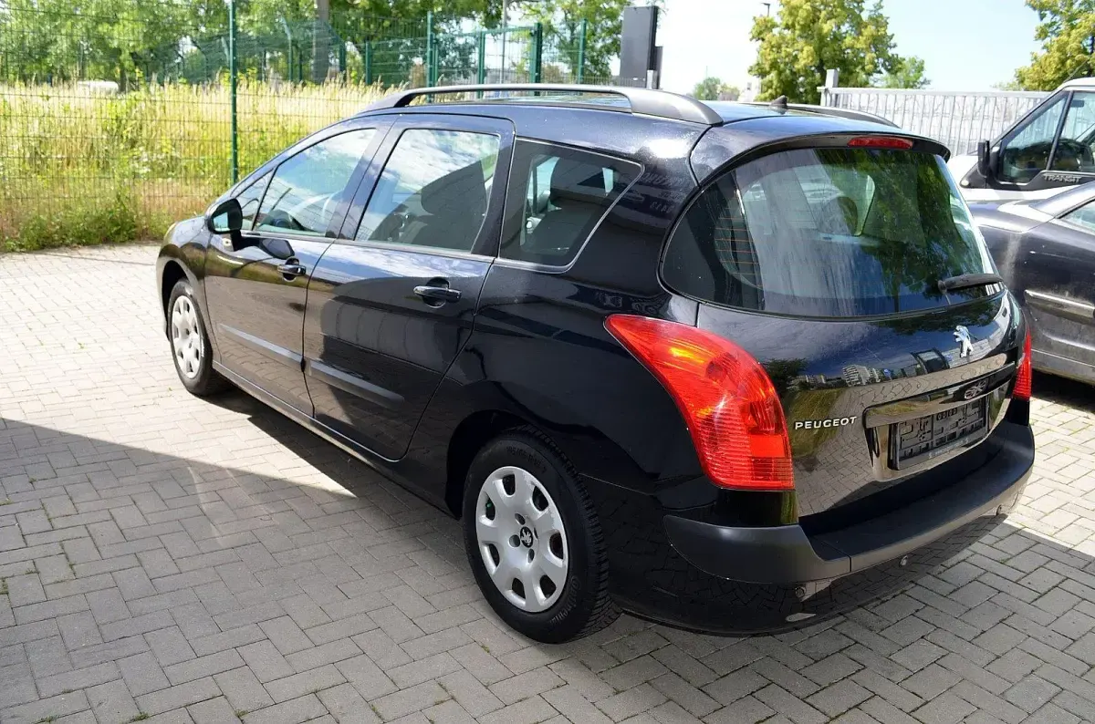 Gebraucht Peugeot 308 SW 92 PS (67 kW) 2011 Schwarz Kombi