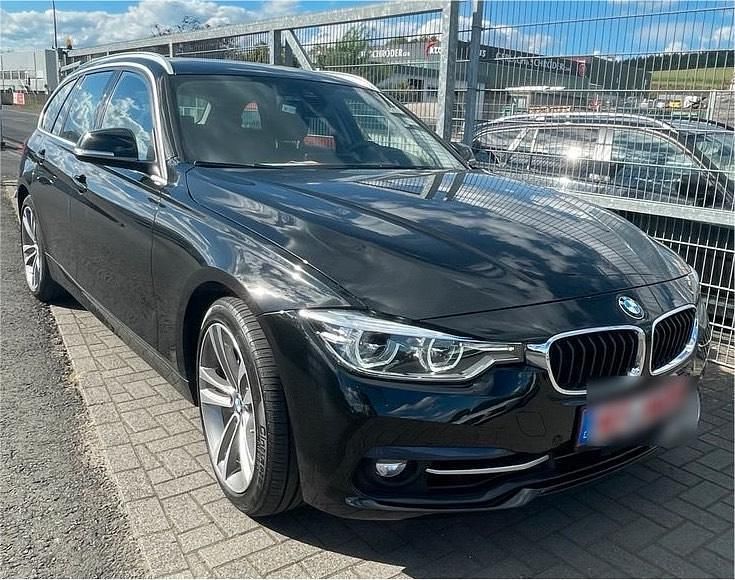 Schwarz Gebraucht 2018 BMW 335 Sport Line Kombi | 19.390 € (Guter Preis) - Bild 1/4