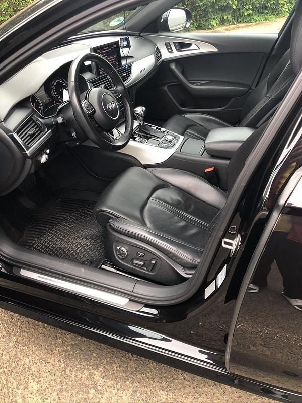 Używany Audi A6 245 KM (180 kW) 2014 Czarny Kombi