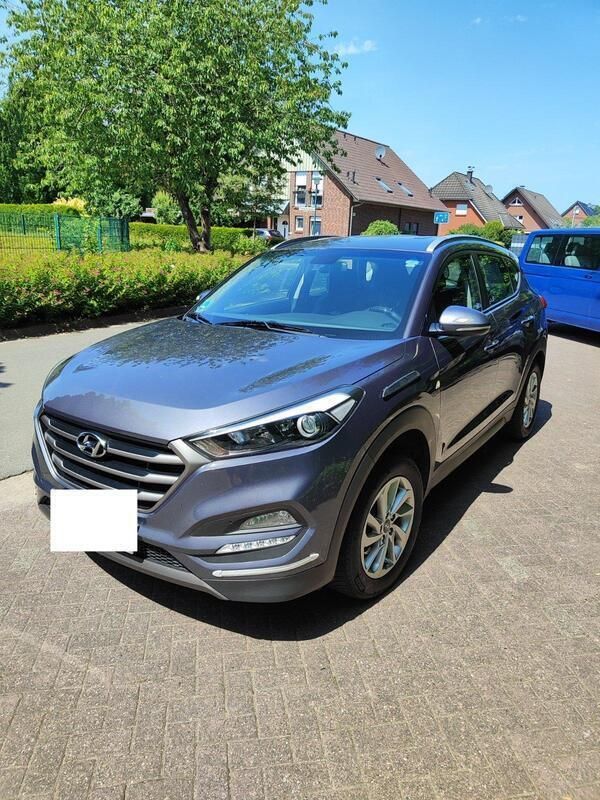 Grau Gebraucht 2015 Hyundai Tucson SUV | 12.999 € - Bild 1/4