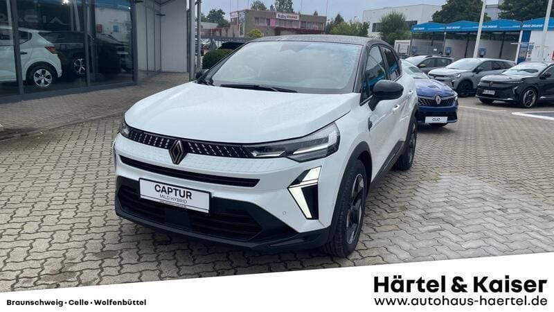 Perlmuttweiß metallic, black pearlschwarz metall (schwarz) Gebraucht 2025 Renault Captur Techno SUV | 24.750 € (Guter Preis) - Bild 1/4