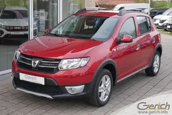Flammenrot metallic Gebraucht 2015 Dacia Sandero Prestige Kleinwagen | 6.900 € (Fairer Preis) - Bild 1/4