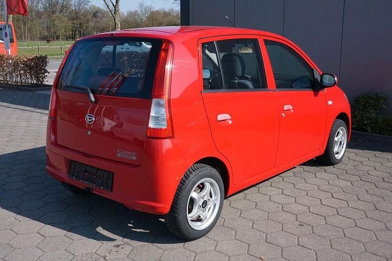 Gebraucht Daihatsu Cuore Plus 58 PS (42 kW) 2006 Rot Kleinwagen