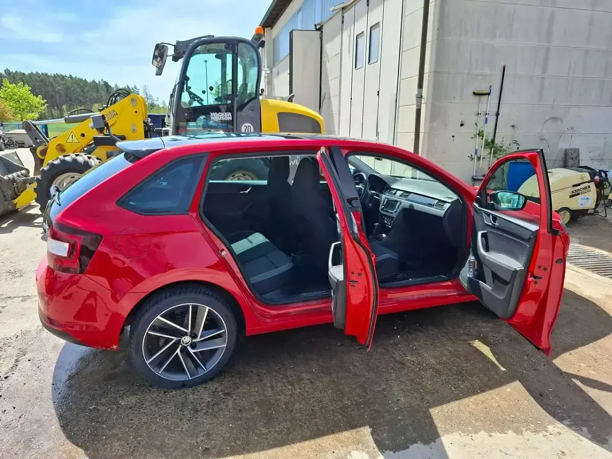 Używany Skoda Rapid Ambition 125 KM (91 kW) 2017 Czerwony Hatchback