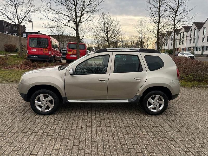 Gold Gebraucht 2012 Dacia Duster Prestige SUV | 3.599 € (Guter Preis) - Bild 1/4