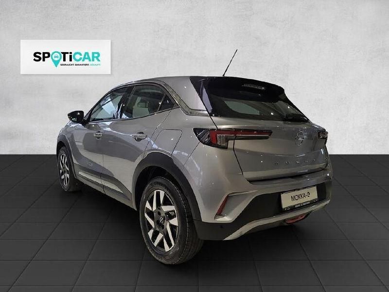 Gebraucht Opel Mokka-e Elegance 100 kW (136 PS) 2024 Kontrast grau (metallic) SUV